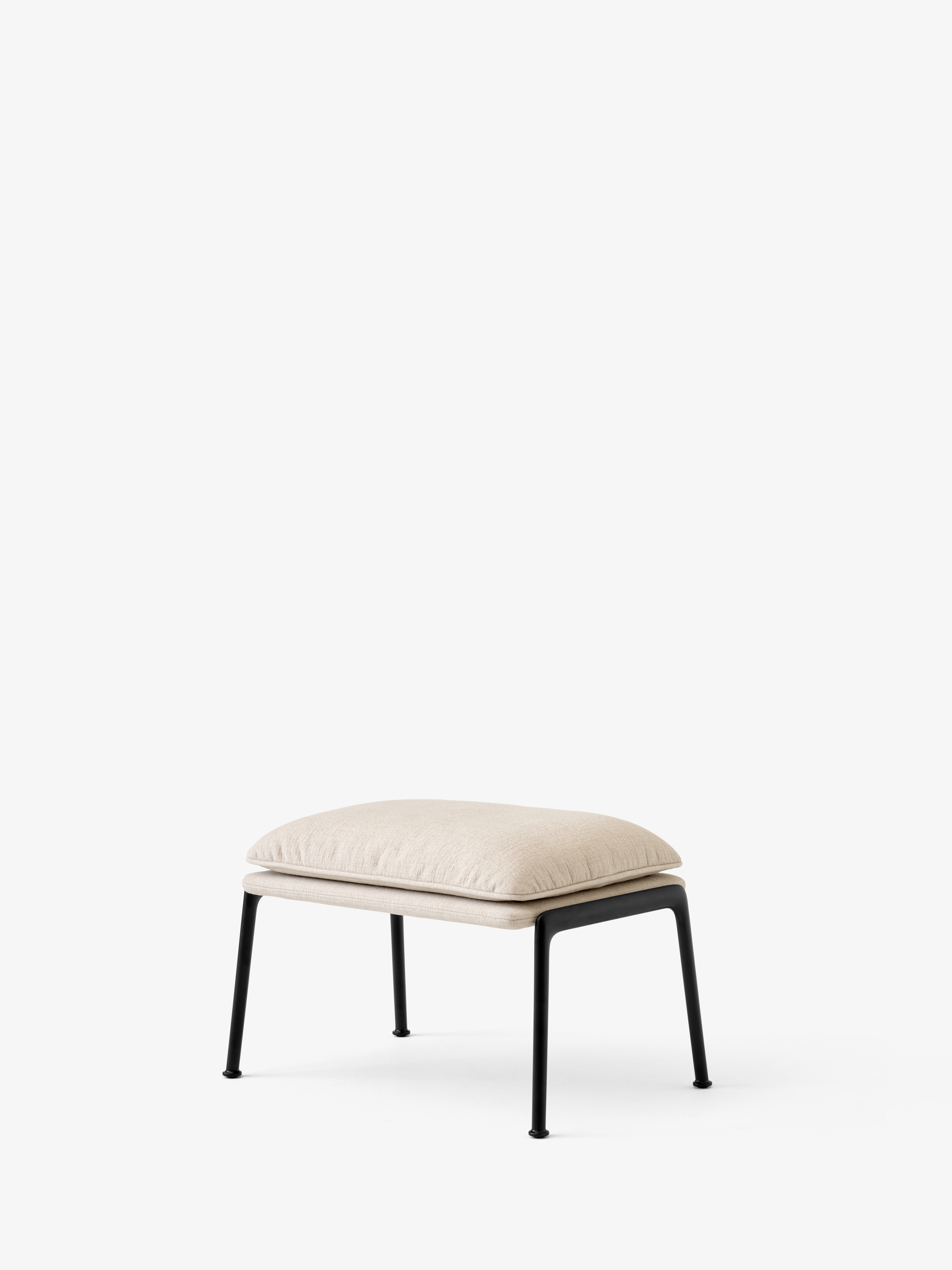 muno-footstool-ln20-warm-black-legs-w-cifrado-0221-angled-front
